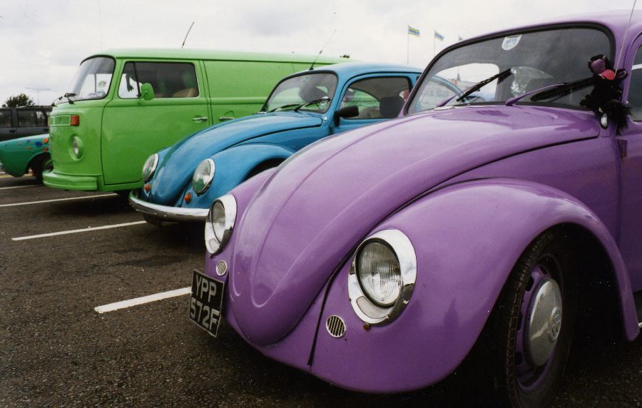 The gang's cars lined up at a service station