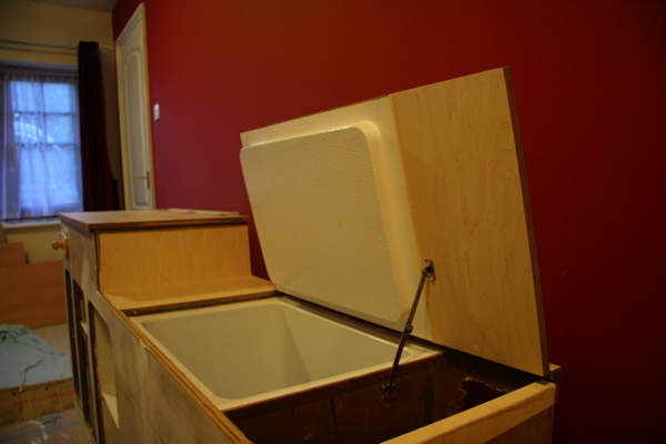 Bracket added to hold up cooler compartment