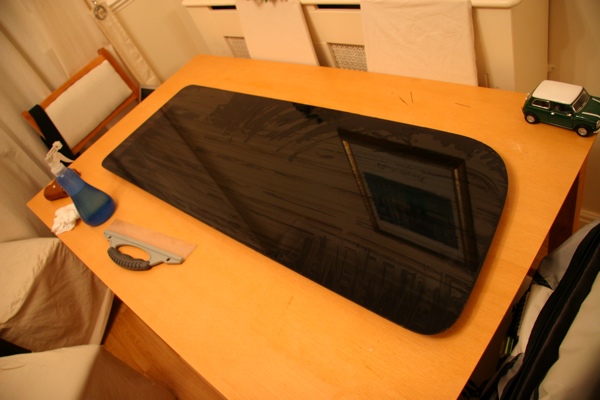 Tinting the windows while out of the bus - Limo black!