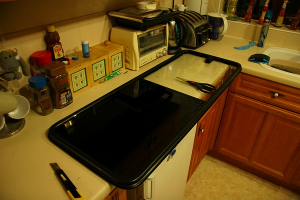 Tinting the windows while out of the bus - Limo black!