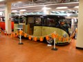 Black and olive split screen bus